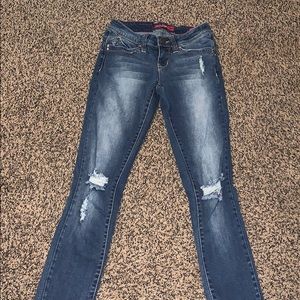 light/dark wash jeans with rips on the knees
